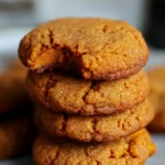 Soft and chewy cinnamon sweet potato breakfast cookies stacked on a plate