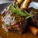 Slow-Cooked Lamb Shanks with Herb-Infused Gravy