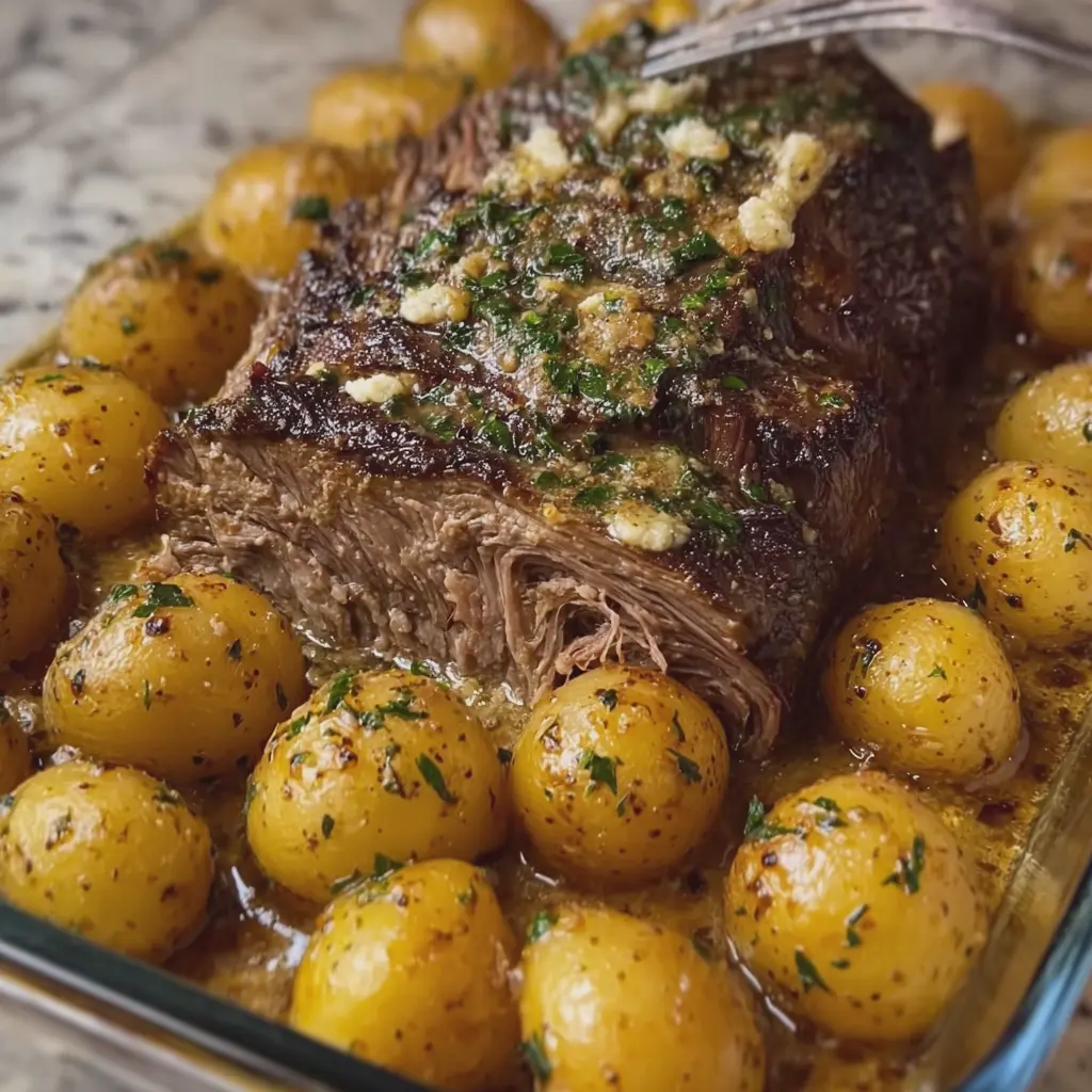 Creamy Garlic Butter Beef Roast with Golden Baby Potatoes